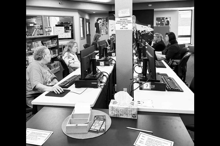 Friends of Library members get genealogy site training