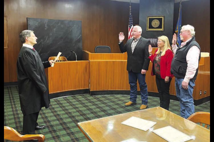 Dobrovolny among those sworn in, re-elected county commission chair