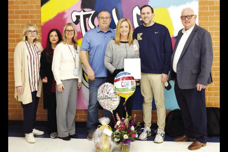 KHS SCIENCE teacher Jan Swart (fifth from left) was announced last week as the Kingfisher Public Schools Districtwide Teacher of the Year. Swart is in her second year of her second stint with KPS. She is pictured with, from left: Heritage Principal Lisa M