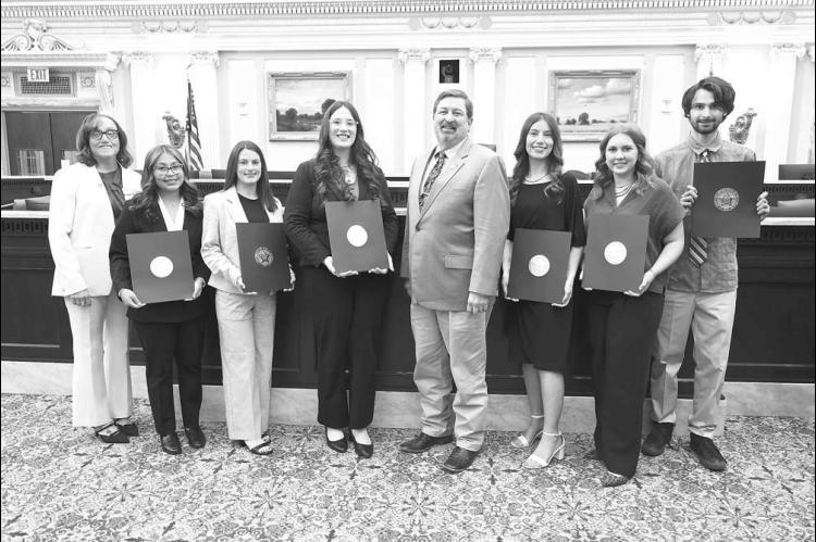 RCC STUDENTS were recently honored at the state Capitol by the Oklahoma Association of Community Colleges for their outstanding academic achievement, record in the classroom and leadership ability. RCC President Jena Marr, left, and Rep. Dick Lowe, center, congratulate Redlands students on their achievements, from left: Emily High, El Reno; Hannah Swart, Kingfisher; Raygann Roark, Duncan; Kenlynn Chaney, Cement; Kyla Bonds, Mustang; and Ethan Gilliland, El Reno. [Photo provided]