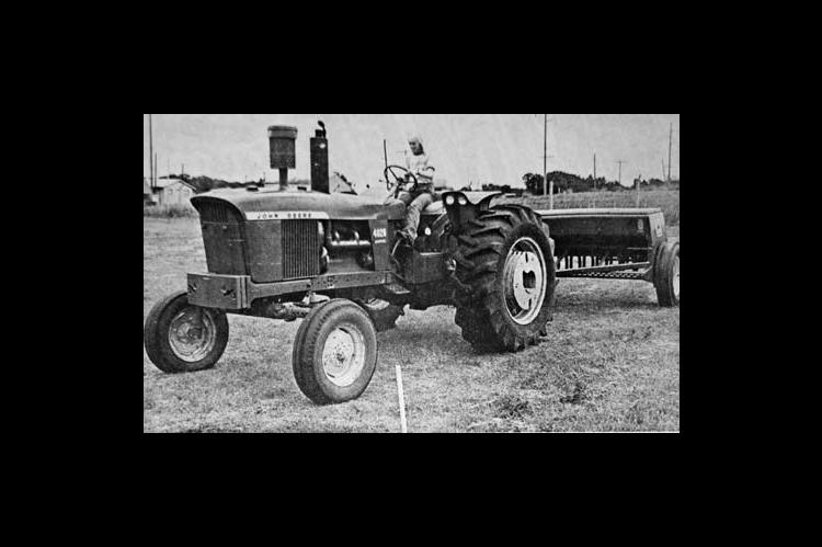 SHIRLEY KLOEPPEL was one of approximately 60 young people participating in the tractor operating school sponsored by the County Extension office. These young people will be ready to help during harvest following this training. The final test for them was Monday when the operated the vehicles. They also had classroom instruction in safety and driving the big machines. (Times, May 27, 1976)