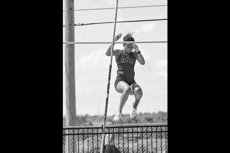KYLEE BELL clears the bar in the pole vault at last weekend’s Class A state meet at Western Heights. The Dover junior won the state title by 2 feet. [Photo by Chris Simon/www.simon-sports-photos.smugmug. com]