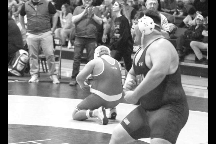 CASHION HEAVYWEIGHT Matthew Stockton reacts after winning his regional semifinal last Saturday. The victory secured his spot at the Class 3A state wrestling tournament for a second straight year. [KT&amp;FP Staff Photo]