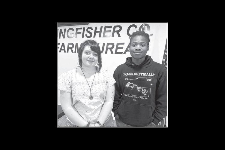 KHS SENIORS Abby Wallace, left, and TJ Washington are the March Junior Lions. They were guests at a recent meeting of the local civic group. [KT&amp;FP Staff Photo]