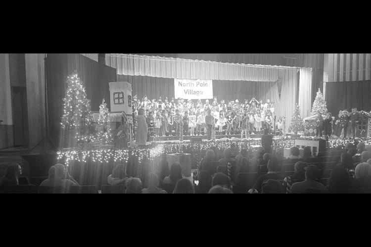 Kingfisher third graders light up ‘Jingle Bell Hill’