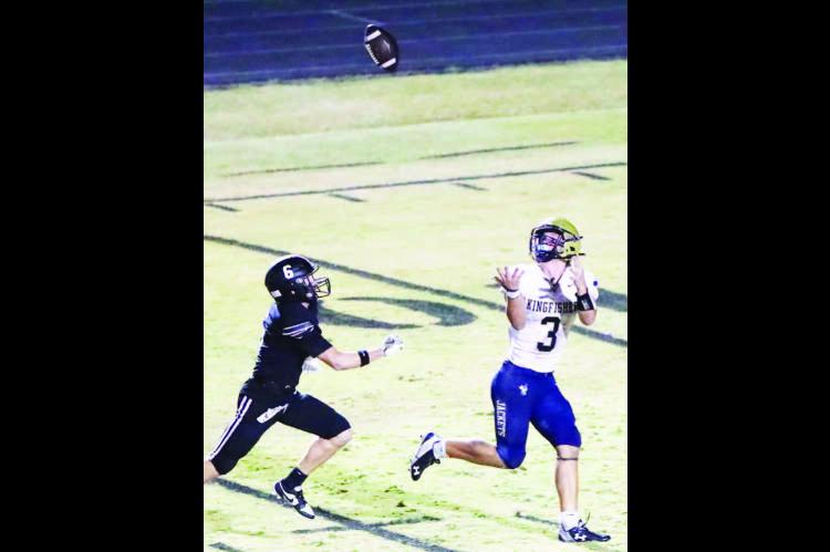 KHS SENIOR Kasen Blair (3) prepares to haul in a bomb from Jhett Birdwell on a play that set up the game-winning touchdown in the Jackets’ playoff win at Lone Grove last Friday. [Photo by Chris Simon/www.simon-sports-photos.smugmug. com]
