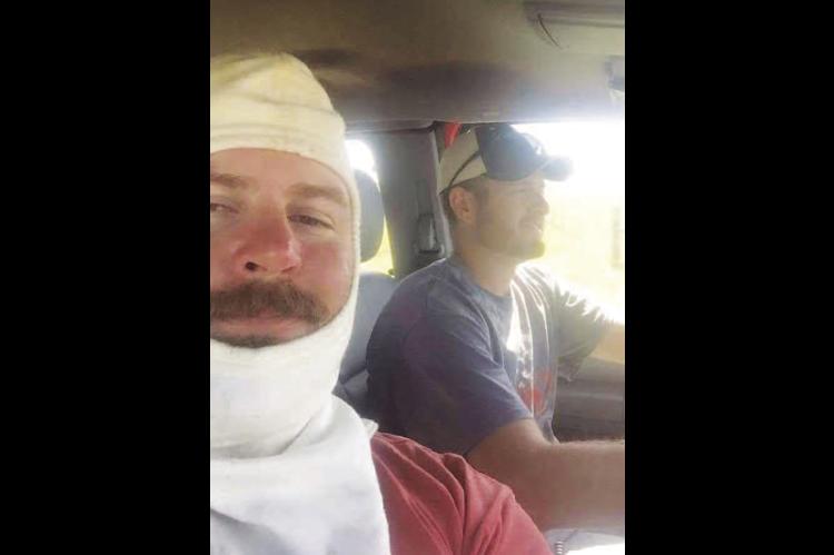LOYAL FIREMEN Ty Gardner (front) and his brother Tracy Gardner are pictured above. Ty suffered a serious heart attack after fighting fires last week and Tracy has been updating the public on his recovery process. [Photo provided]