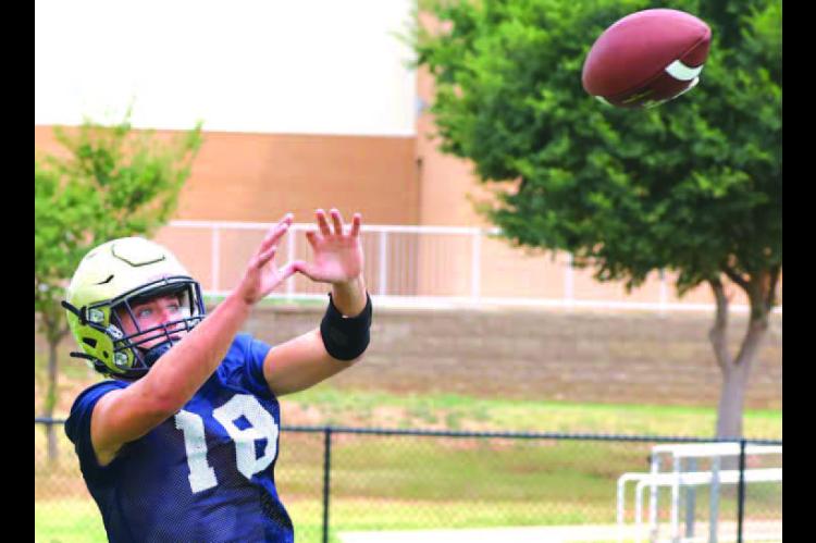 FOOTBALL PRACTICE BEGINS