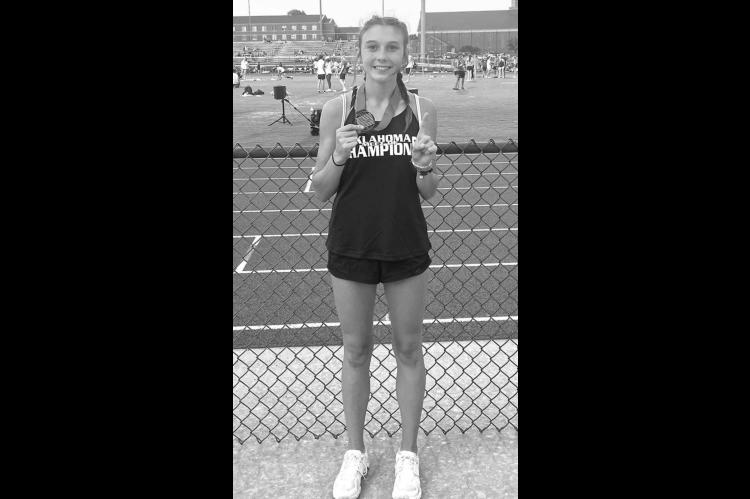 Taylor wins long jump at Meet of Champions