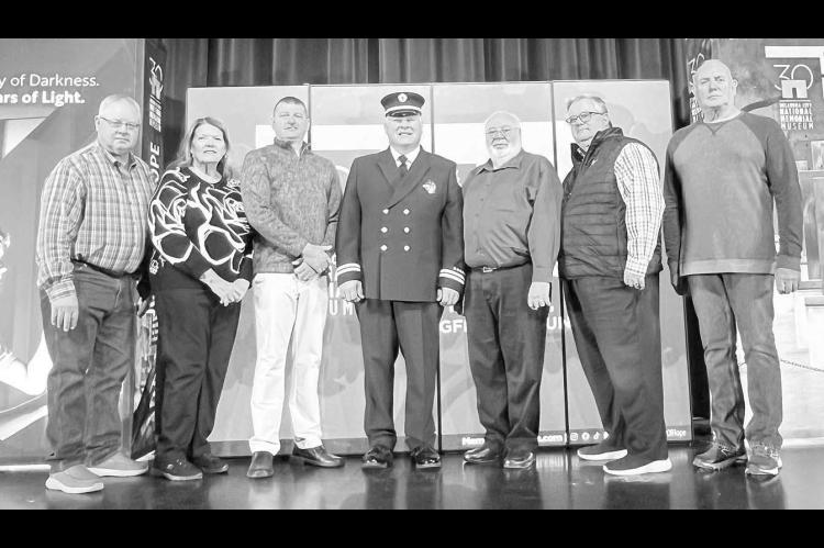 BOMBING FIRST RESPONDERS – Seven 1995 Oklahoma City Murrah bombing first responders were special guests in Hennessey during an OKC National Memorial &amp; Museum program for high school and middle school students last Thursday. Pictured are, from left: 