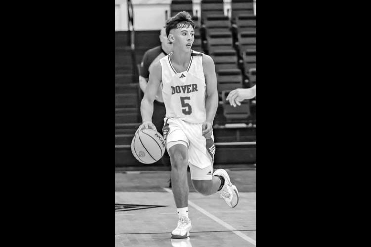CASEN BUCK was one of the Dover Longhorns to make clutch free throws in the Skeltur Conference Tournament championship game. [Photo by Chris Simon/www. simon-sports-photos.smugmug.com]