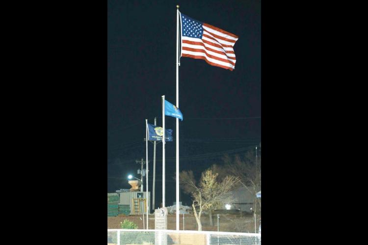 The flag waves proud... and TALLER than ever