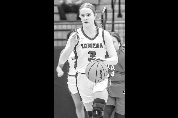 FRESHMAN Reagan Snowden had a massive championship game as Lomega won its 10th straight conference tournament title. [Photo by Chris Simon/www.simon-sports-photos.smugmug.com]