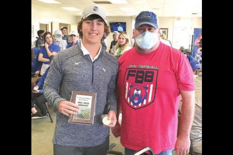 Burnham top individual at John Marshall tourney