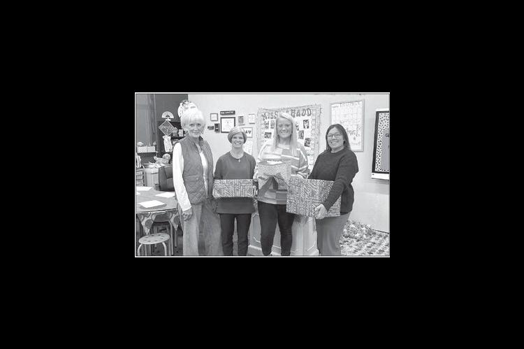 Local DKG chapter donates more than 150 books to OES teachers