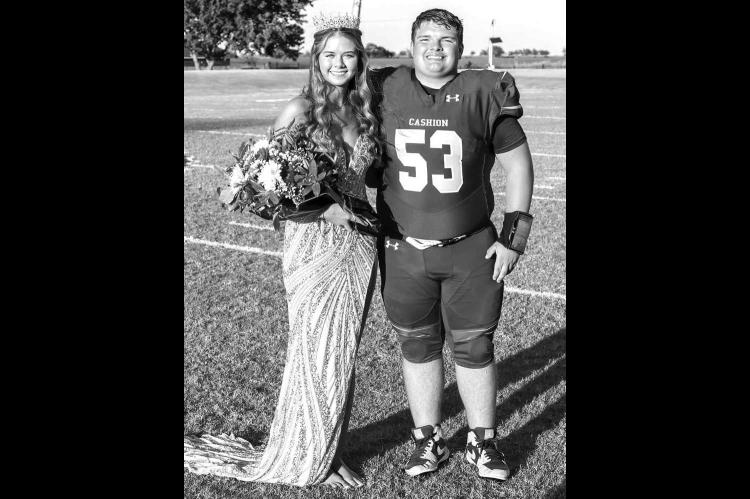 CASHION ROYALTY - Cashion senior Adilee Jerry was crowned homecoming queen and Matthew Stockton the king last Friday prior to their team’s 35-12 win over Merritt. Stockton had two tackles in the game while Jerry kicked fi ve extra-points for the Wildcats. [Photo by Brad Stone/www.bestone.shootproof.com]