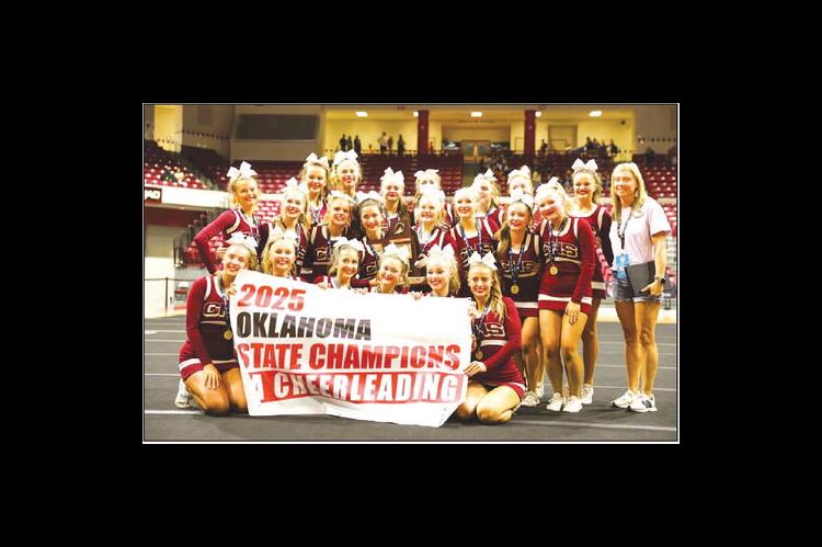 CASHION CHEERLEADERS show off their newest banner after they were announced as the Class 2A state champions last Saturday in Tulsa. Team members are seniors Jayce Bradley, Kylie Henson, Hadley House, Kyndal Isom and Azlynn Thomas; juniors Dylan Ahem, Ruby