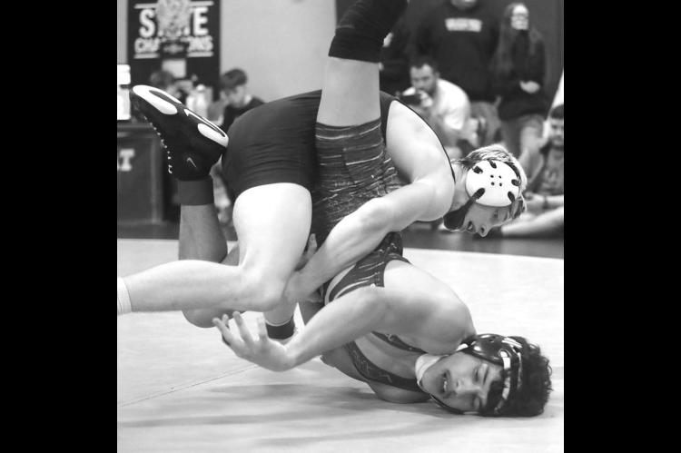 KINGFISHER SOPHOMORE Jaxon Sheppard works over an opponent last Friday at the Western Conference Wrestling Tournament. [KT&amp;FP Staff Photo]