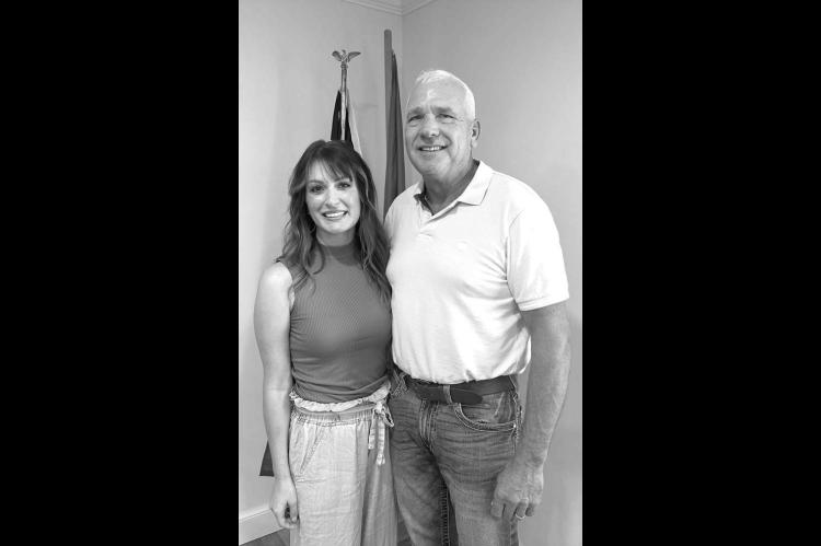 CURRENT KINGFISHER County FSA CED Kate Ryan, left, spoke at the Lions Club meeting last Thursday. She’s pictured with former CED Randall Newton, a Lions Club member who arranged for her appearance at the meeting. [KT&FP Staff Photo]