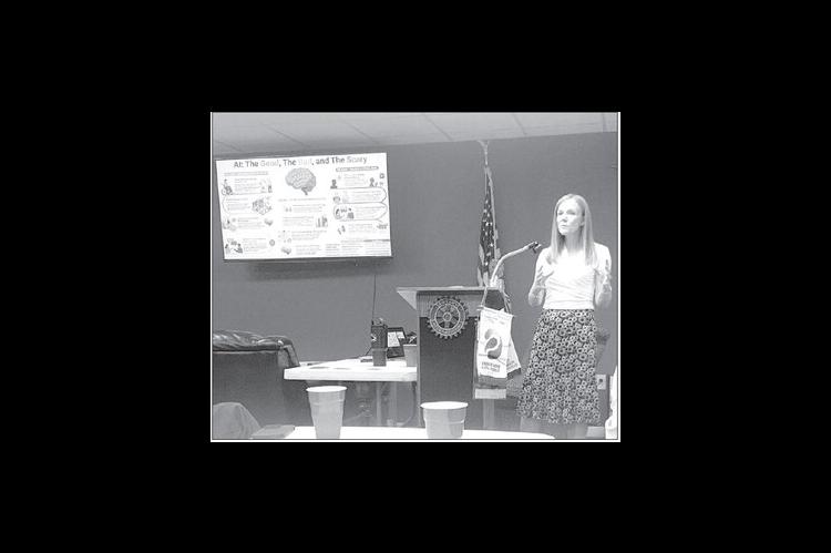 ROTARY SPEAKER Jayne Suess addresses the club during a recent meeting. She discussed the pros and cons of AI to the club members and guests. [KT&amp;FP Staff Photo]