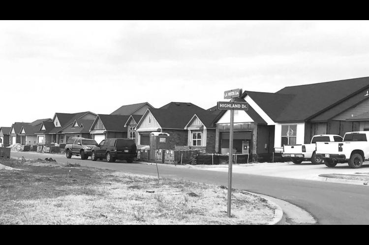 Homebuilders update Kingfi sher Rotarians on progress of Highlands West housing a