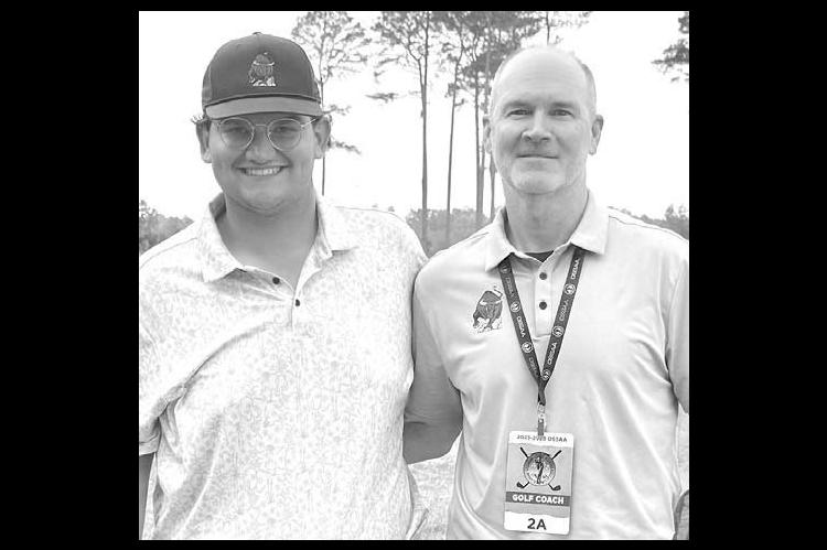 Sam Wood (left) and coach Chris Combs