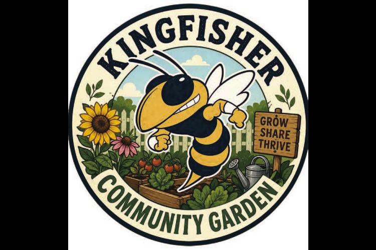 Group plants seed for community garden