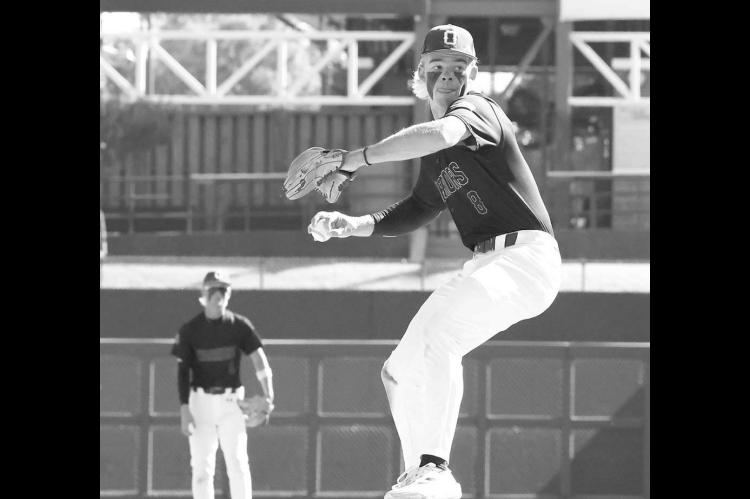 EASTON ROBY delivers a pitch during last fall’s state championship game. Roby picked up one of Okarche’s wins in Alabama last week as the Warriors went 3-1 on their Spring Break trip. [KT&amp;FP Staff Photo]