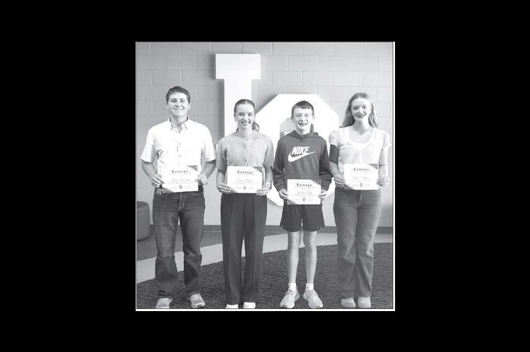 Lomega Students of the Month for August 2026 were announced at the recent Raider Roundup. On the left are Laken Lewallen and Claire Myers, who were presented the honor for high school students. Earning the honor for junior high students were Jackson Ogle and Grace Myers, pictured on the right. [Photo provided]