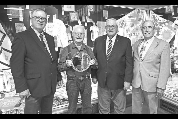 BEST BAKER – Don Robison, Kingfi sher, topped the senior division whole wheat breads category in the 2024 Best of Wheat Baking Contest held during the Oklahoma State Fair on Sept. 22. From left are Raymond Parrish, Oklahoma Wheat Commission vice chairman, Hunter; Robison; Don Schieber, OWC chairman, Ponca City; and David Gammill, OWC District 4 director, Chattanooga. [Photo provided]
