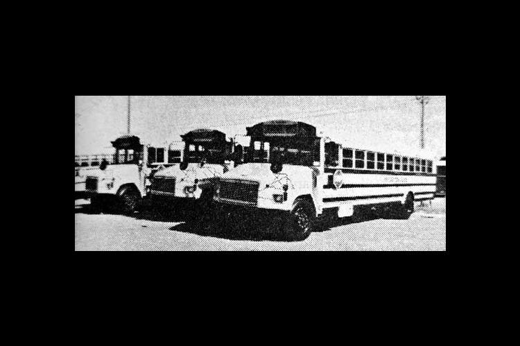 NEW BUSES — All four buses Kingfisher Public Schools recently purchased were delivered this week. The purchase was made possible through a $200,000 transportation bond approved by Kingfisher voters in February. The Kingfisher Board of Education approved the purchase of two 65-passenger buses at $44,799 each, one 71-passenger bus for $45,330 and a 22-passenger bus for $34,275. Also purchased was a Chevrolet Suburban for school use. (Times, July 22, 2001)