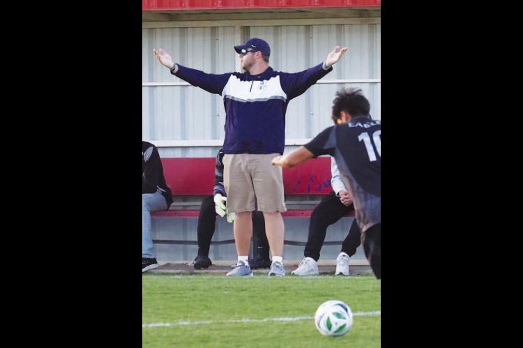 KHS BOYS soccer coach Isaac Waltman reacts to one of his players being knocked down against Weatherford earlier this season. Waltman and the Jackets were knocked out of the playoffs due to a forfeit by another team last week. [KT&amp;FP Staff Photo]