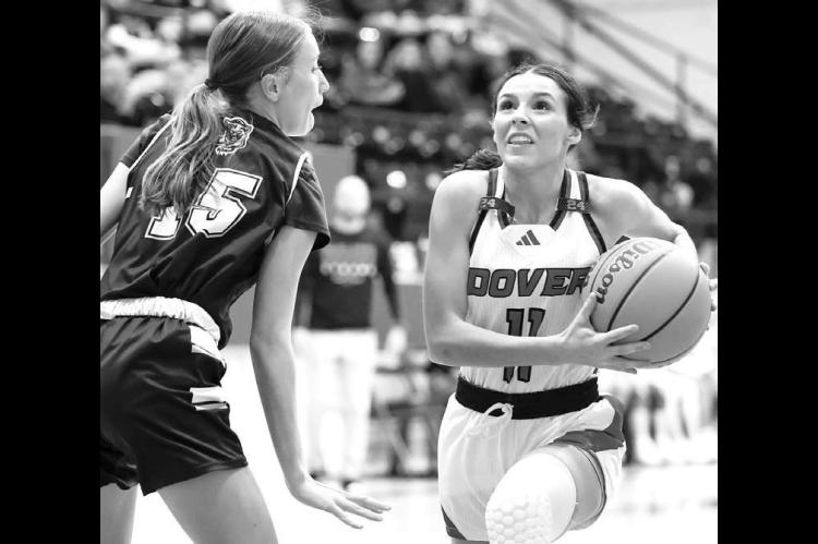 RYLEE BUCK drives to the basket against Pond Creek-Hunter. Buck was crowned homecoming queen, then scored 11 points in Dover’s win over the Panthers. [Photo by Russell Stitt/www.stitt.smugmug.com]