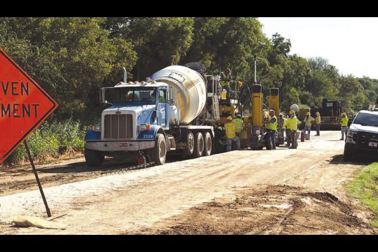 LAST LOAD – Steve Altman provided this photo to the KT&amp;FP of the final truckload of concrete being poured on a repaving project of the Dover-Crescent Road. The three-mile stretch required about 2,000 loads of concrete and has been in the works for n
