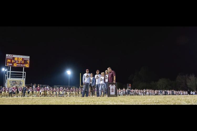 Rivalry set aside to honor late player