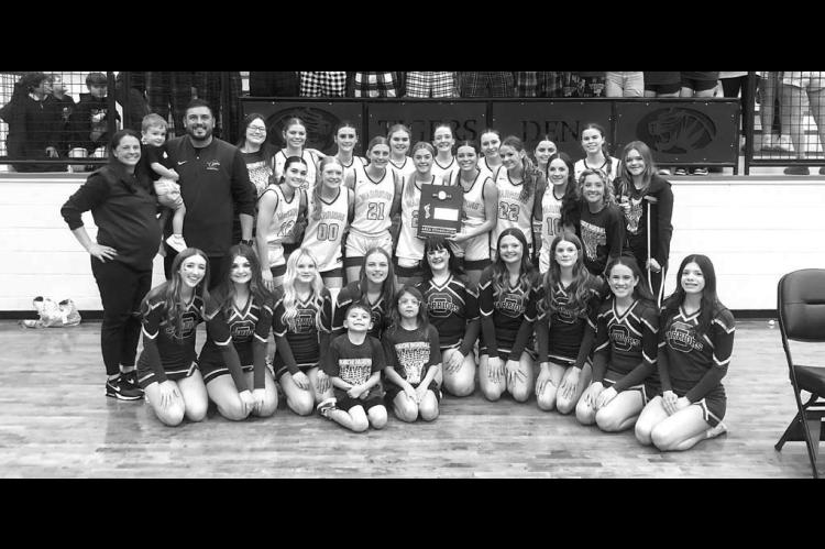 LADY WARRIORS – Okarche downed Red Oak on Saturday to claim an area consolation championship trophy and advance to the state tournament. [Photo provided]