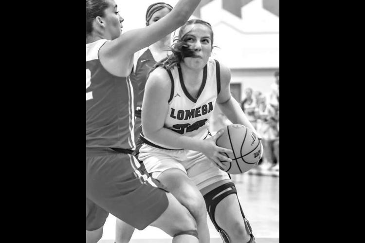 HADLEY OTT nailed 11 3-pointers in Lomega’s two regional games to help lead the Lady Raiders into this week’s area championship game. [Photo by Chris Simon/www.simon- sports-photos.smugmug.com]