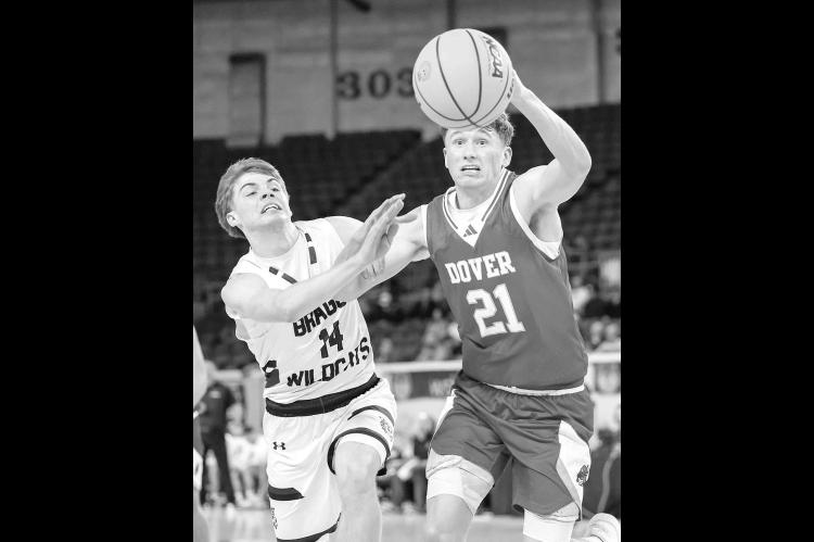 DOVER’S CARTER KITCHENS (21) and Braggs’ Burr Jaynes go after a loose ball. Kitchens and the Longhorns were dominant in the game as they thumped the Wildcats 60-36. [Photo by Russell Stitt/www.stitt.smugmug.com]