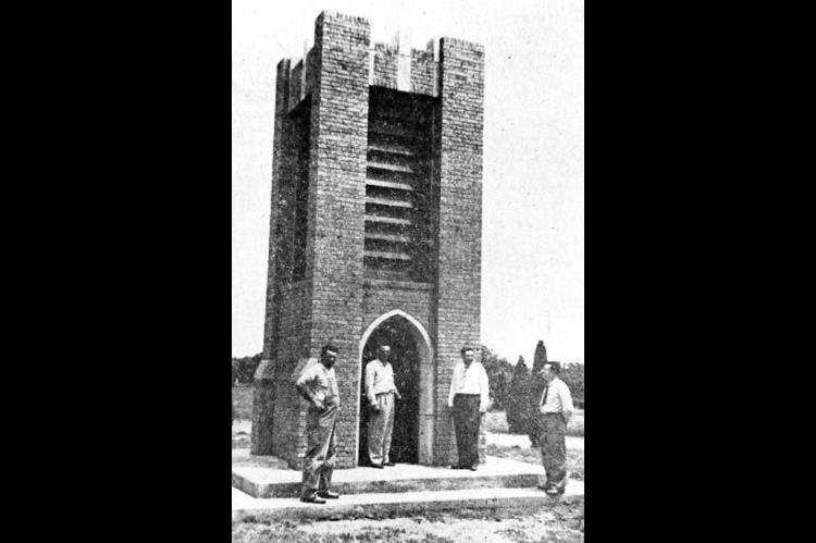 Shown inspecting the completed Memory Chimes tower at Kingfisher cemetery are, left to right, Wesley Scheffler of Hitchcock, contractor, and George Boeckman, Russel Frakes and Harold Hubbard, Rotary club trustees for the Memory Chimes Trust fund. Installation of the chimes equipment is planned soon. Continued gifts from the public are invited, to retire $2,500 indebtedness incurred in the construction.