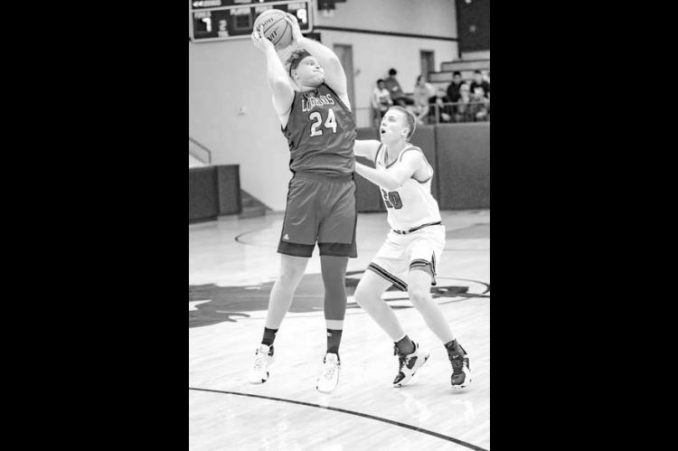 Longhorns knock off   M-O in OT