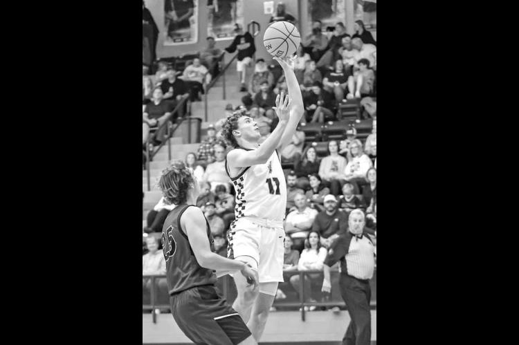 JETT MUEGGENBORG had a double-double, which included 44 points, as Okarche used a strong second half to down Amber-Pocasset. [Photo by Chris Simon/www.simon- sports-photos.smugmug.com]