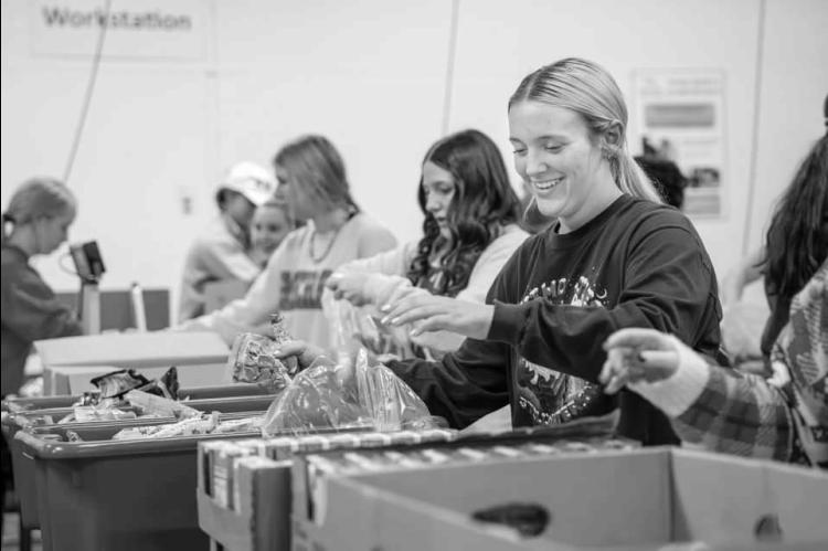 Ten Cashion FFA members volunteered at the Oklahoma Regional Food Bank with the Oklahoma Pork Council on Dec. 13. FFA members Dally Pedersen, Maggie Carroll and Sadie Weaver helped bag and package meals to be distributed to students in Oklahoma. [Photo pr