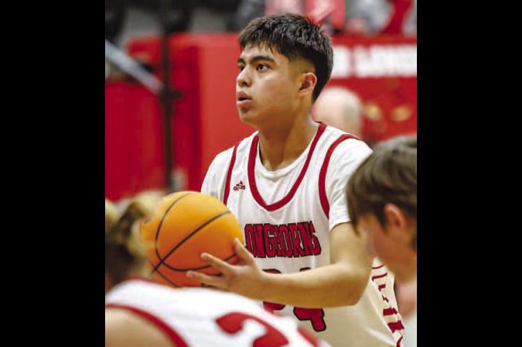 DOVER SOPHOMORE Randy Vitales collapsed during a game Thursday at Mulhall-Orlando High School. After life-saving measures were administered on-site, Vitales was taken to Children’s Hospital in Oklahoma City. [Photo by Chris Simon]