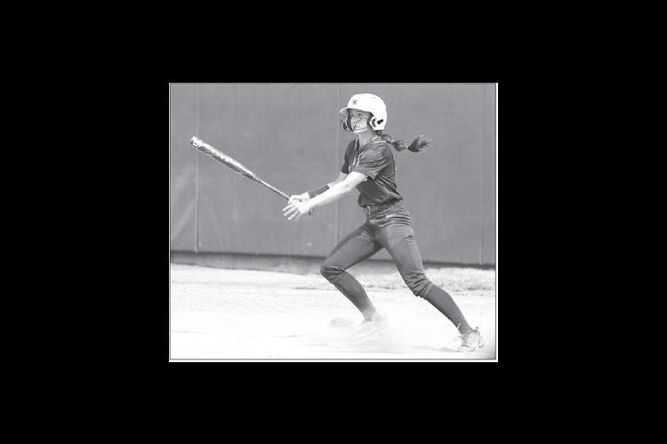 KHS JUNIOR Ryan Scammahorn watches her base hit drop in the outfield during last Saturday’s loss to Plainview at Devon Park. [KT&amp;FP Staff Photo]