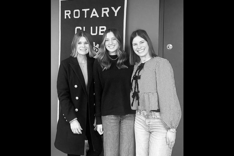 KINGFISHER ROTARIAN Carly Franks, left, welcomes KHS seniors Emiley Watkins, center, and Mia Hartman to a recent meeting of the civic group. [KT&FP Staff Photo]