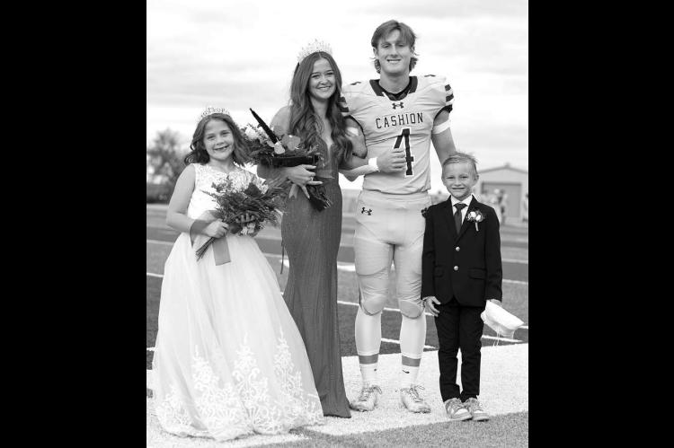 Hank Brown was named the king and Caroline Oakley crowned the queen last Friday at Cashion High School’s 2026 football homecoming. The coronation was held prior to the Wildcats’ 54-13 win against Meeker. Julia Kordis served as the flower girl during the ceremony while Foster Mounce was the crown bearer. The win improved Cashion to 3-2 on the season and 2-0 in District 2A-II-1 games. The Wildcats travel this week to take on Christian Heritage Academy. [Photo by Rylee Broadbent Photography]