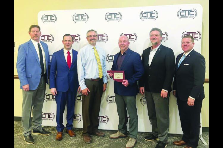 STRONG PARTNERS – Chisholm Trail Technology Center named Pioneer Telephone Cooperative as its Business Partner of the Year during an appreciation banquet last week. Accepting the plaque for Pioneer was General Manager Blake Callaham (third from right). 