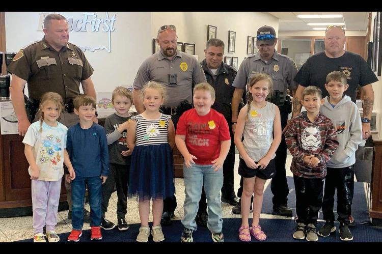 OUR COPS ARE TOPS Bank hosts law enforcement coffee 