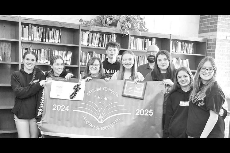 Okarche yearbook staff and advisers are pictured with their Gold Level banner for the 2025 yearbook. Pictured are, from left, Morgan Shepherd, Jordyn Darst, Traci Fuller (adviser), Ayden Munier, Chesney Black, Robert Ford (adviser), Jaici Easton, Gabby Ma