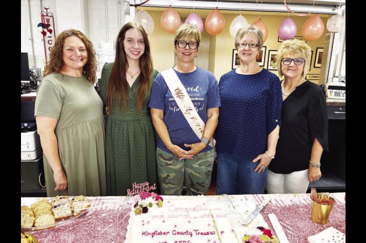 RETIRIN’ ROBIN – Robin Rother (center) is retiring as the Kingfisher County treasurer and was honored Thursday with a retirement reception. Rother has served as treasurer since 2018. She is pictured with, from left: Lindsey Shimanek, Caitlin Wiebelt, Kelly Majetic and Beverly Cluck. Majetic has been appointed to serve out the remainder of Rother’s term and will begin her own term as treasurer starting next year. [KT&amp;FP Staff Photo]
